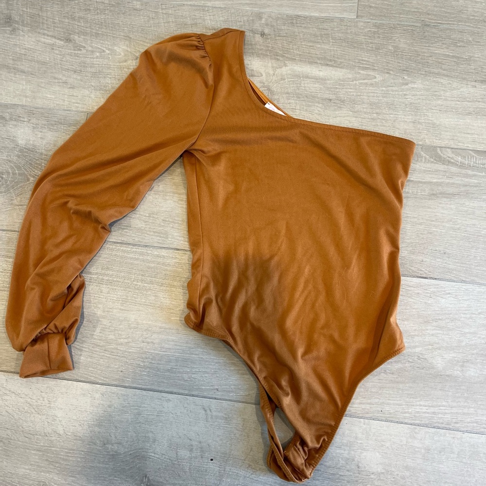 Pink lily one sleeve bodysuit